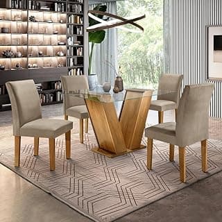 Conjunto de mesa de jantar com 4 cadeiras Classic em veludo Ypê, estrutura dourada e tampo de vidro, sobre tapete com padrões geométricos.
