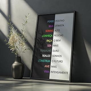 Quadro decorativo com frases motivacionais coloridas em preto e branco contra uma parede cinza