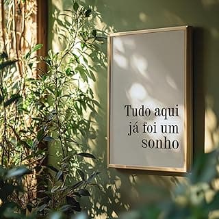 Quadro decorativo com frase motivacional 'Tudo aqui já foi um sonho', moldura dourada, fundo branco.
