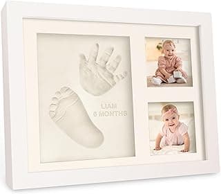 Quadro branco com impressões de mão e pé de bebê, fotos de bebê, texto 'LIAM 8 MONTHS'.