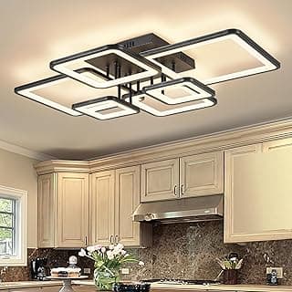 Luminária de teto moderna preta com LEDs brancos em cozinha com armários claros
