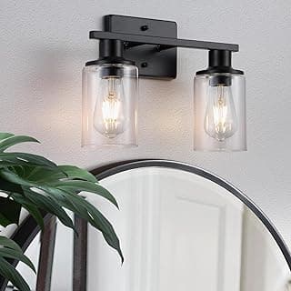 Luminária de banheiro preta fosca com dois vidros transparentes montada na parede acima de um espelho