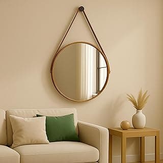 Espelho redondo caramelo com alça em couro para decoração de sala.