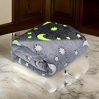 Manta infantil brilha no escuro com estampas de lua e estrelas, cinza e verde fluorescente