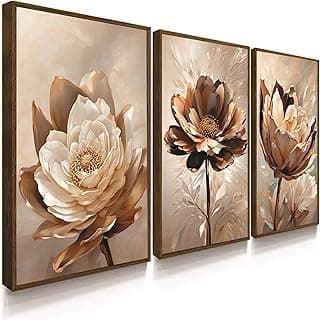 Quadros decorativos com flores em tons de cobre e ouro, molduras douradas, fundo claro.